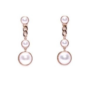 Round ivory dangling earrings